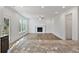 Bright living room with hardwood floors and fireplace at 2126 Seavey Dr, Decatur, GA 30032