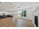 Open living room with fireplace and large windows offering natural light at 2126 Seavey Dr, Decatur, GA 30032