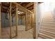 Unfinished basement with framed walls and exposed utilities at 2126 Seavey Dr, Decatur, GA 30032