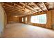 Unfinished basement with large windows and exposed utilities at 2126 Seavey Dr, Decatur, GA 30032