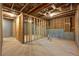 Unfinished basement with framed walls and exposed utilities at 2126 Seavey Dr, Decatur, GA 30032