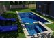 Backyard oasis featuring a rectangular pool with a tanning ledge and baja shelf at 600 Jones Rd, Roswell, GA 30075