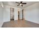 Bedroom with hardwood floors, ceiling fan and ensuite bathroom at 884 Derrydown Way, Decatur, GA 30030