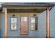 Attractive wooden front door with covered porch at 884 Derrydown Way, Decatur, GA 30030