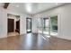 Bright living room with hardwood floors and access to a screened porch at 884 Derrydown Way, Decatur, GA 30030