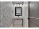 Stylish powder room with patterned wallpaper and modern sink at 884 Derrydown Way, Decatur, GA 30030