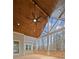 Spacious covered porch with wood ceiling and ceiling fan at 234 Aberdeen Way, Woodstock, GA 30188