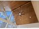 Relaxing covered porch with wood ceiling, ceiling fan, and view of the backyard at 234 Aberdeen Way, Woodstock, GA 30188