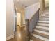 Elegant staircase with wood treads and black metal balusters at 976 Memorial Se Walk, Atlanta, GA 30316