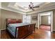 Spacious bedroom with hardwood floors, ceiling fan, and access to another room at 2516 Alston Se Dr, Atlanta, GA 30317