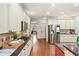 Modern kitchen with stainless steel appliances and granite countertops at 6234 Creekstone Path, Cumming, GA 30041