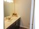 Clean bathroom with vanity, sink, and updated fixtures at 573 Auburn Crossing Dr, Auburn, GA 30011