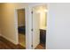 Guest bathroom with vanity and dark brown cabinets at 573 Auburn Crossing Dr, Auburn, GA 30011