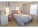 Cozy bedroom featuring a comfortable bed and a calming decor at 573 Auburn Crossing Dr, Auburn, GA 30011