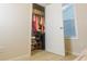 Well-organized closet with hanging rods and storage shelves at 573 Auburn Crossing Dr, Auburn, GA 30011
