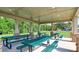 Covered patio with picnic tables at 573 Auburn Crossing Dr, Auburn, GA 30011