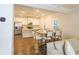 Open concept kitchen and dining area with seating for six at 573 Auburn Crossing Dr, Auburn, GA 30011