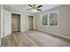 Spacious bedroom featuring hardwood floors and lots of natural light at 1018 Duke Se Dr, Conyers, GA 30013