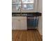 Stainless steel dishwasher in a modern kitchen with hardwood floors at 234 Carlyle Park Ne Dr # 234, Atlanta, GA 30307