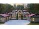Grand estate home with stone and stucco facade, red roof, and gated entry at 1416 Walcutts Nw Way, Marietta, GA 30064
