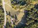 High-angle view of a property with a house and large lot near a road at 3636 Anneewakee Rd, Douglasville, GA 30135