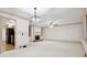 Spacious living room featuring a fireplace and hardwood floors at 5417 Trentham Dr, Dunwoody, GA 30338