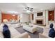 Comfortable living room with fireplace, built-in shelving and ample natural light at 5417 Trentham Dr, Dunwoody, GA 30338