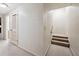 Basement hallway with carpet and neutral tones at 5417 Trentham Dr, Dunwoody, GA 30338