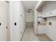 Hallway with access to laundry and other rooms at 5417 Trentham Dr, Dunwoody, GA 30338