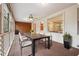 Screened porch with a dining table and view of the backyard at 5417 Trentham Dr, Dunwoody, GA 30338