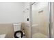 Clean bathroom with a shower, toilet, and tile flooring at 5417 Trentham Dr, Dunwoody, GA 30338