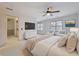 Spacious bedroom with ceiling fan and large windows at 5417 Trentham Dr, Dunwoody, GA 30338