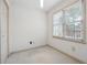 Bright bedroom with two windows and neutral decor at 5417 Trentham Dr, Dunwoody, GA 30338