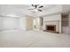 Main bedroom with fireplace, built-in shelving and carpet at 5417 Trentham Dr, Dunwoody, GA 30338
