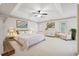 Large main bedroom with high ceiling, ceiling fan and plush carpet at 5417 Trentham Dr, Dunwoody, GA 30338