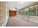 Spacious screened porch overlooking a wooded area at 5417 Trentham Dr, Dunwoody, GA 30338