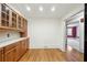 Bright dining area with hardwood floors and access to other rooms at 5417 Trentham Dr, Dunwoody, GA 30338