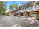 Townhome complex with multiple units and parking area at 5417 Trentham Dr, Dunwoody, GA 30338