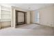 Finished basement room with built-in shelves and murphy bed at 5417 Trentham Dr, Dunwoody, GA 30338