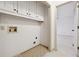 Laundry area with cabinets and a washer/dryer hookup at 5417 Trentham Dr, Dunwoody, GA 30338