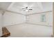 Bright main bedroom with a window and ceiling fan at 5417 Trentham Dr, Dunwoody, GA 30338
