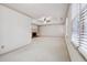 Bright Gathering room with a fireplace and neutral carpeting at 5417 Trentham Dr, Dunwoody, GA 30338