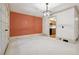 Bright dining room with access to the kitchen and screened porch at 5417 Trentham Dr, Dunwoody, GA 30338