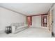 Open living area with carpet flooring and multiple entrances at 5417 Trentham Dr, Dunwoody, GA 30338