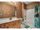 Bathroom with a tub, shower, and wood vanity at 9140 N Links Dr, Covington, GA 30014