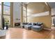 Spacious living room with hardwood floors and fireplace at 9140 N Links Dr, Covington, GA 30014