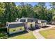 Large house with unique roofline and circular driveway at 2023 Stoneleigh Dr, Stone Mountain, GA 30087