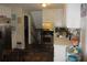 Kitchen with stainless steel appliances, white cabinets, and tile flooring at 1318 Shoreham Dr, Atlanta, GA 30349