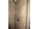 Shower with tiled walls and single lever faucet at 1318 Shoreham Dr, Atlanta, GA 30349