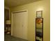 Main bedroom with a king-size bed, double doors to closet at 1318 Shoreham Dr, Atlanta, GA 30349